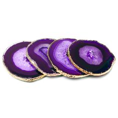 three slices of purple eggplant sitting on top of each other