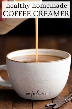 coffee being poured into a white cup with the words, how to make healthy homemade coffee creamer