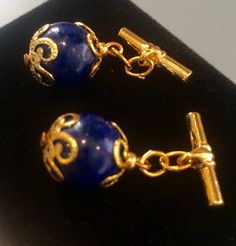 Vintage T chain lapis lazuli men's shirt cufflinks  Gilt metal Approx bead size 14 mm approx Deep blue colour Cabochons well matched International buyers welcome Formal Lapis Lazuli Jewelry, Handmade Lapis Lazuli Jewelry For Formal Occasions, Formal Lapis Lazuli Jewelry With Round Beads, Formal Blue Lapis Lazuli Jewelry, Antique Cufflinks, Diamond Cufflink, Vintage Cufflinks, Types Of Gemstones, Blue Colour