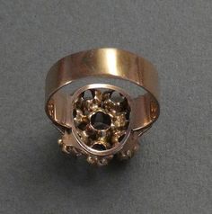 "Antique 14K rose gold diamond cluster ring old and new 8 diamonds size 5.5 total weight 5.0 grams approximately .58\" in diameter insurance included in shipping The jewelry in this Etsy shop is from the collection and store inventory of my mother, Marcia Grunewald. She collected antique jewelry from the early 1960s until she passed away in 2000. She and my father started their antique store in Galena, IL in 1973. They did antique shows in the midwest and southeast for 27 years. She accumulated Antique Show, Antique Store, Twist Ring, Hair Rings, Diamond Cluster Ring, Antique Stores, Rose Gold Diamonds, Diamond Cluster, Diamond Sizes