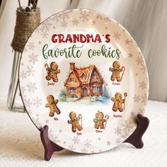 a white plate with gingerbread cookies on it and the words grandma's favorite cookie