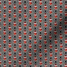 a gray and red pattern with black dots on the bottom, in an abstract manner