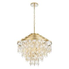 a gold chandelier with white beads hanging from it's centerpieces