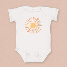 For that sunny baby🌞, this boho sunburst beach baby body suit is perfect. This soft and comfy baby outfit is perfect for a day at the beach, summer afternoon and makes a great gift for a new summer baby. DETAILS This soft comfy jumper is just the cuddle your little one needs. Featuring double-needle ribbed binding on neck, shoulders and leg opening with reinforced three snap closure, it'ss sure to keep up with any babe on the move. Check the size card to determine your perfect fit and for speci Playful White Short Sleeve Bodysuit For Spring, Printed Cotton Short Sleeve Bodysuit For Summer, White Summer Bodysuit For Playtime, Summer White Bodysuit For Playtime, White Short Sleeve Bodysuit For Summer, Printed Onesie For Beach In Summer, Summer Playtime Short Sleeve Bodysuit, Unisex Short Sleeve Bodysuit For Summer Playtime, Summer Beach Onesie With Prints