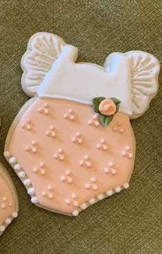 two decorated cookies sitting on top of each other