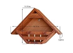 a wooden birdhouse with measurements for the top and bottom