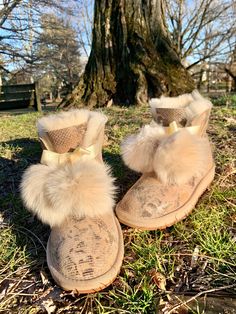 "Pom-poms aren't just for pep rallies! Our \"Salali Boot\" features our premium sheepskin and genuine rabbit fur pom-poms. They're sure to keep you cool to frigid temps! *Snakeskin print *Made with premium sheepskin and rabbit fur *Ankle length, split leather *Rubber outersole *There may be differences in color due to variances in lighting or monitor display" Pep Rally, Cold Weather Boots, Weather Boots, Sheepskin Boots, Boots Winter, Fur Boots, Snakeskin Print, Fur Pom Pom, Rabbit Fur