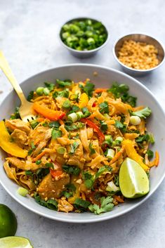 a white bowl filled with rice and vegetables