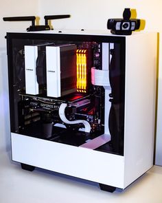 a white and black computer case sitting on top of a table