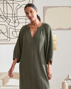 One of Oprah's Favorite things, in a limited edition color, this cozy, 100% cotton fabric, is a year around staple. The double gauze fabric feels like you are wearing your favorite pajamas, and bonus, it's not the least bit sheer! To make it even more irresistible, we added pockets and a flattering asymmetric hem. The raw edge details add a bit of deconstructionist chic. Once it's on, we dare you to take it off. Green V-neck Tunic For Fall, Green Relaxed Fit Beach Tunic, Green Cotton Lounge Dress, Green Cotton Loungewear Dress, Green Cotton Dress For Loungewear, Green Relaxed Fit Casual Tunic, Green Casual Relaxed Fit Tunic, Soft Cotton Dress, Caftan Tunic