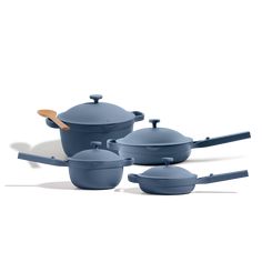 blue pots and pans with wooden spoons