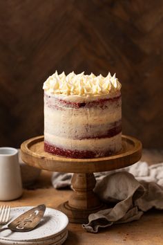 A red velvet cake on a wood cake stand. Rustic Red Velvet Cake, Naked Red Velvet Cake, Red Velvet Cake Decoration, Espresso Cake, Cream Cheese Frosting Cake, Cake Carrier, Silky Texture