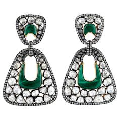 Handcrafted from 18-karat gold & sterling silver, these earring are set with 12.01 carats of rose cut diamonds and 11.4 carats malachite with blackened finish. FOLLOW MEGHNA JEWELS storefront to view the latest collection & exclusive pieces. Meghna Jewels is proudly rated as a Top Seller on 1stDibs with 5 star customer reviews. All items manufactured by us are handmade and can be customized or redesigned. Composition Size-55X35 MM Total Weight-30.5 Gold Weight(Gms)-1.72 Silver Weight(Gms)-24.098 Diamond Wt(Cts)-12.01 Malachite Wt(Cts)-11.4 Art Deco Drop Earrings, Diamond Chandelier Earrings, Malachite Earrings, Platinum Earrings, Diamond Bows, Sterling Silver Dangle Earrings, Bow Earrings, Custom Earrings, Brown Diamond