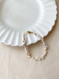 Irregular Pearl Bracelet 14K Gold Filled Pearl Bracelet - Etsy White Adjustable Gold Bracelet For Anniversary, Dainty Hand-strung Bracelets For Wedding, Delicate Single Strand Bracelet For Gift, Delicate Single Strand Bracelet Gift, Delicate Single Strand Bracelets As Gift, Delicate Single Strand Bracelets For Gifts, White Gold Oyster Bracelet Gift, White Gold Oyster Bracelet - Gift, White Single Strand Bracelet As A Gift