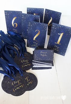 blue and gold birthday party decorations with tags