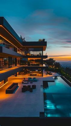 an outdoor pool and lounge area at dusk