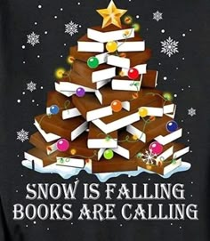 a christmas tree made out of books with the words snow is falling books are calling