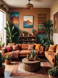 a living room filled with lots of furniture and potted plants on top of it