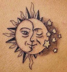 a sun and moon tattoo on the chest