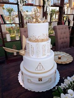 a large white cake sitting on top of a table