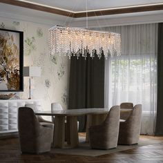 a chandelier hanging from the ceiling in a dining room with chairs around it