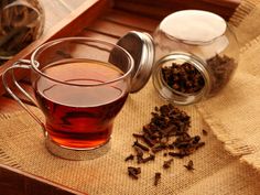 Clove tea: From weight loss to better digestion, here is how this tea can help you | The Times of India Clove Tea, Cloves Benefits, Lower Cholesterol Naturally, Ginger Benefits, Ginger And Cinnamon, Indian Kitchen, Ldl Cholesterol, Tea Benefits, Indian Spices