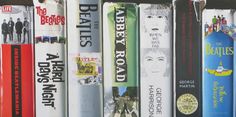 a row of books sitting on top of a shelf