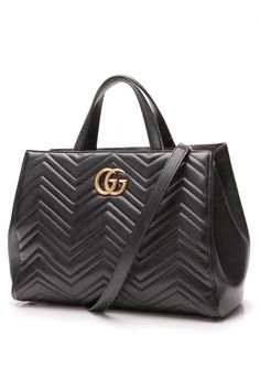 As versatile as it is stylish, this authentic Gucci Marmont medium Matelasse bag is one that belongs in your collection. Featuring black leather and iconic GG logos both on the back and front, this bag screams understated Gucci from every direction. Wear this bag everyday with ease as the interior space has enough room for your daily essentials!       Condition - Gently UsedThis bag is in great condition with minor wear on the corners, edges, and protective metal feet with light creasing/scratch Gucci Marmont Medium, Gucci Marmont, Perfect Handbag, Versace Bags, Burberry Handbags, Dooney Bourke Handbags, Gucci Handbags, Handle Bag, Leather Clutch