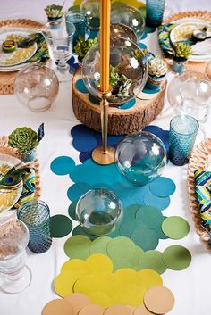 a table is set with plates and bowls