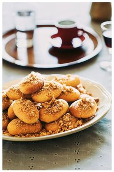 a white plate topped with cookies on top of a table