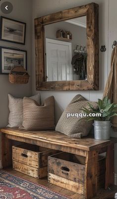 a wooden bench sitting under a mirror in a living room next to a potted plant