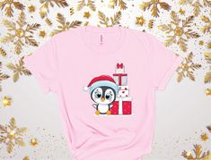 Christmas Penguin Shirt, Cute Christmas Tee, Christmas Gift Tee, Xmas Party Shirt, Funny Penguin Xmas Shirt, Penguin Lover shirt, Xmas Tee  HOW TO ORDER  → Please pick your t-shirt type and size. → Please pick your t-shirt color → Select the quantity → Click add to cart  SIZE  → We have size chart on under t-shirt color charts.  ABOUT PPRODUCT  Brand of Shirts :BELLA CANVAS Solid Colors: %100 Cotton Heather Colors: %52 Cotton %48 Polyester All type shirts are very soft  MATERIAL CARE INSTRUCTION  → Inside out, wash with delicate cycle. → Lay flat to dry → Do not bleach → Do not iron directly onto the design → Do not dry clean.  PRODUCTION  → Processing time is 1-3 business days.  Shipping  → Domestic Shipping → First Class 2-5 Business days → Priority Mail 1-3 Business days → Express Mail Penguin Shirts, Penguin Shirt, Funny Penguin, Penguins Funny, Xmas Tees, Cute Penguin, Xmas Shirts, Christmas Penguin, Cute Penguins