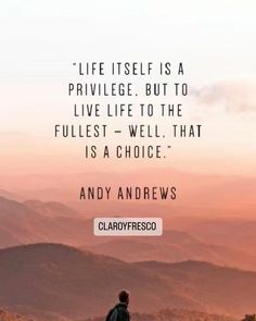 a man standing on top of a mountain with a quote about life itself is a privilege, but to live life to the fullest - well that is a choice