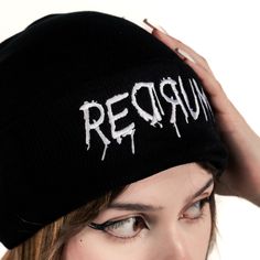 Introducing the Redrum Beanie, a high-quality unisex black acrylic beanie that's both durable and comfortable. Featuring an intricate embroidery design, this beanie is a true statement piece, perfect for adding a bold touch to any outfit. Enjoy lasting comfort and standout style with this exceptional accessory. Alternative Winter Cap Hat, Alternative Winter Hats For Streetwear, Alternative Winter Cap, Alternative Winter Streetwear Hat, Alternative Beanie For Streetwear, Black Punk Beanie Hat, Punk Black Beanie Hat, Punk Style Black Beanie Hat, Fitted Beanie For Streetwear