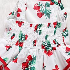 Product Title: Baby Cute Strawberry Print Suspender Backless DressKeyword Tag: Baby Girl Knitted Dress*Pattern: Fruit*Soft and comfy* Available for Machine Wash as well as TumbleDry* Imported Are you look for a best quality and cheapest dress? Then Baby Cute Strawberry Print Suspender Backless Dress is the best one for you! The Trendy colours with amazing designs for reflect fashion vibes that will embrace you the moment you wear them. The pattern of Baby Cute Strawberry Print Suspender Backless Cute White Dress With Strawberry Print, White Sundress For Summer, Cute Strawberry Print Dress For Vacation, Cute Strawberry Print Vacation Dress, Sleeveless Strawberry Print Dress For Beach, Sleeveless Strawberry Print Beach Dress, Sleeveless White Dress With Strawberry Print, White Summer Sundress For Playtime, Playful Fitted White Sundress