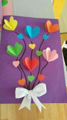 the paper flowers are made to look like hearts