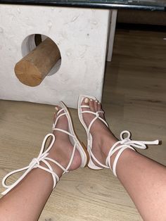 A soft leather ivory flat with long laces to tie how you want. Aloha brand Size break down: 37: 6.5 38: 7.5 39: 8.5 40: 9 White Leather Strappy Lace-up Sandals, White Leather Lace-up Sandals With Round Toe, White Lace-up Sandals With Flat Heel For Spring, White Adjustable Lace-up Sandals, White Lace-up Flat Heel Sandals For Spring, White Leather Lace-up Sandals With Flat Heel, White Lace-up Sandals For Spring, White Leather Flat Heel Lace-up Sandals, White Leather Lace-up Sandals