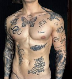 a man with many tattoos on his chest