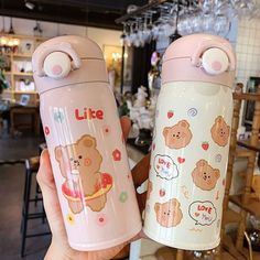 two pink and white teddy bear water bottles