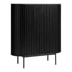 a black cabinet sitting on top of a white floor