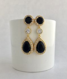 I've created these gorgeous black cubic zirconia bridal tear drop earrings in gold plated brass setting. Earrings feature a large teardrop with pear cut black cubic zirconia center surrounded by tiny round zirconia Crystals. Teardrop dangles from a earstud with brilliant cut black cubic zirconia center and surrounded by tiny round zirconia crystals and a round cubic zirconia connector. Total length of the earring is 4.8 cms. For matching necklace click: https://www.etsy.com/listing/777567011/bla Silver Drop Earrings Wedding, Wedding Gold Jewelry, Black Wedding Jewelry, Gold Earrings Long, Black Gold Earrings, Blue Gold Wedding, Blue Wedding Jewelry, Black Crystal Earrings, Pink Pearl Earrings