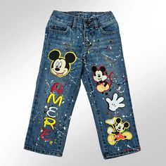 Introduce your child to a world of magic with our Mickey Mouse Pants Set! This delightful ensemble includes lightweight denim pants featuring playful paint splatter and charming Mickey images, capturing the fun and whimsy of Disney's beloved character. Paired with a soft, 100% cotton shirt personalized with your child's name, age, and a vibrant image of Mickey Mouse, this set is perfect for birthdays, special occasions, or everyday adventures. Comfortable and stylish, it's designed to make your Mickey Mouse Custom Outfit, Mickey Mouse Pants, Lightweight Denim Pants, Mickey Mouse Images, Boys Denim, Everyday Adventures, French Guiana, Paint Splatter, Cayman Islands