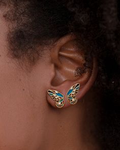 These butterfly wings earrings are dainty enough to be worn everyday and original enough to turn some heads! As unique as each butterfly, these post earrings sit just right on the ear lobe and follow its way up. You can wear one on each ear or double them on the same ear if you have 2 piercings. The enamel color combination is pastel blue and turquoise, and you can select where each color goes on the wings. Alternatively if you preferred a different color take a look at our other earrings here. 2 Piercings, Butterfly Wings Earrings, Wings Earrings, Mint Coral, Butterfly Earring, Butterfly Earrings Gold, Butterfly Wing Earrings, Blue Coral, Butterfly Wing