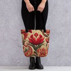 Embrace the charm of spring with our Tulip-Paisley Fusion: Tote Bag. This tote bag is a beautiful amalgamation of nature's elegance and bohemian aesthetics. The design showcases a delightful array of tulips mingling with intricate paisley motifs, creating a Spring Bloom that's sure to catch eyes. Whether you're out for shopping or a day at the beach, our Boho Elegance: Tulip and Paisley Tote Bag is the perfect companion to carry your essentials in style. A spacious and trendy tote bag to help you carry around everything that matters. * 100% spun polyester fabric * Bag size: 15″ × 15″ (38.1 × 38.1 cm) * Capacity: 2.6 US gal (10 l) * Maximum weight limit: 44lbs (20 kg) * Dual handles made from 100% natural cotton bull denim * Handle length 11.8″ (30 cm), width 1″ (2.5 cm) * The handles can s Trendy Tote Bags, Trendy Tote, Spring Blooms, Fabric Bag, Showcase Design, Natural Cotton, Tulips, Polyester Fabric, Paisley