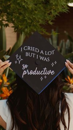 a woman wearing a graduation cap that says i tried alot but was productive