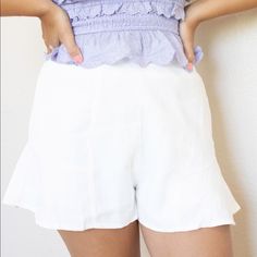 This Item Can Be Found Cheaper On Www.Shopgardendaze.Com Our Ivory Butterfly Shorts Feature An Elastic Waist And Ruffled Hem. Made With Lightweight, Flowy Material, Pair With Our "Lavendar Lemonade Top" For The Perfect Summer Look! 92% Rayon 8% Spandex Hand Wash Cold Color: Ivory True To Size Fit Measurements: Measurements Are Approximate: Small: Bust 32-33” | Waist 26-27" | Hips: 36"- 37" Medium: Bust 34-35" | Waist 28-29" | Hips: 38"- 39" Large: Bust 36-37" | Waist 29-30" | Hips: 40"- 41" White Bottoms With Built-in Shorts, High Waist White Bottoms With Built-in Shorts, White Ruffled Bottoms For Spring, Spring Cream Bottoms With Built-in Shorts, Chic White Bottoms With Built-in Shorts, Fitted Shorts With Elastic Waistband For Brunch, Feminine Cotton Bottoms For Brunch, Feminine Cream Bottoms For Beach, Feminine Cream Bottoms For The Beach