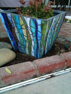 a planter that is sitting on the ground