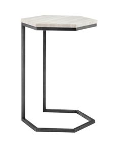 the side table is made from black metal and marble with a hexagonal design