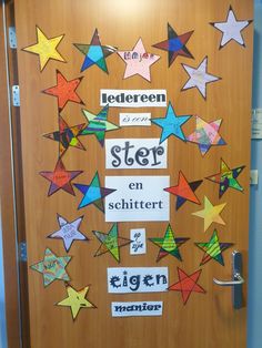 a door decorated with colorful stars and the words stef en schitter on it