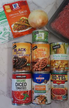 canned food items on a counter top with ingredients to make it easier for them to eat